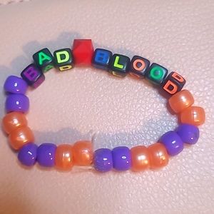 Taylor swift eras tour bad blood bracelet